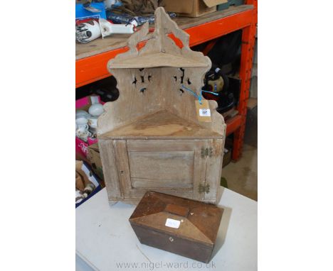A wooden corner whatnot and a tea caddy.