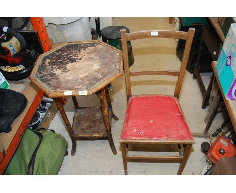 A bamboo octagonal table and ladder back chair.