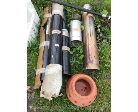 Three lengths of enamel flue pipe plus two lengths of stainless steel.