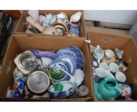 Three boxes of miscellaneous china including cups, saucers, biscuit barrels, blue and white plates and a blue jug.