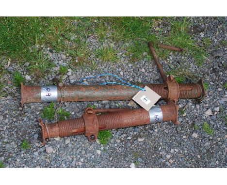 Two short Acrow props.
