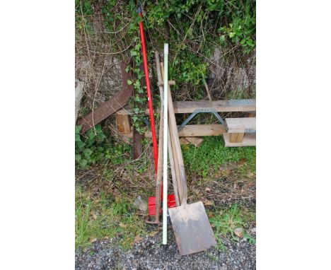 A quantity of tools, rakes, shovel, etc.