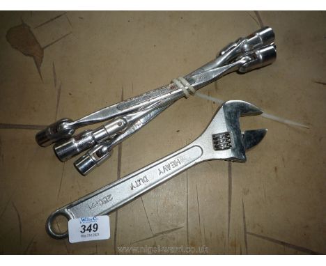 A 250 mm adjustable Spanner and four ''Draper'' double-ended swing-end Spanners, 7/16'' &amp; 1/2' a/f, 1/2'' &amp; 9/16'' a/