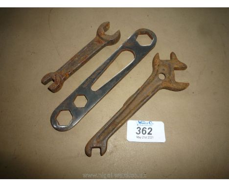 A collectable "Rudge Whitworth Ltd." pressed-steel multi-spanner and two other unusual spanners.