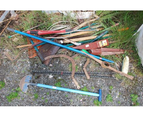 A quantity of garden tools, clippers and net, posts, etc.,