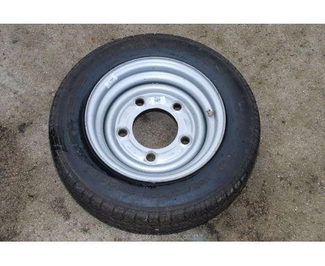 A compass 155/70 R12C tyre on a 4.5J x 12 H2 5 stud rim. Believed for an Ifor Williams trailer.