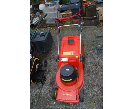 A Wolf Tools Senator electric mower.