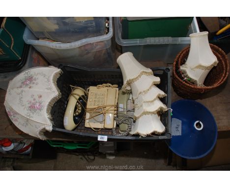 A box of telephones, lamp shades, etc.,