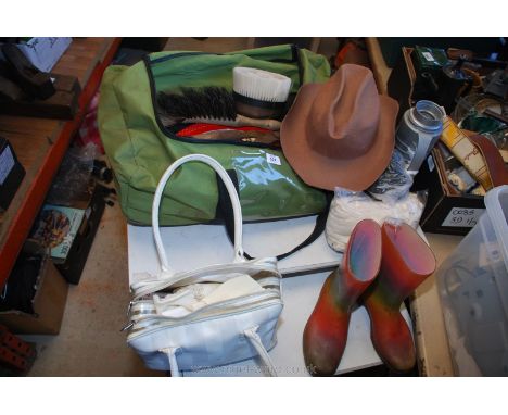 A holder of wellies, brushes, a first-aid kit, etc.,