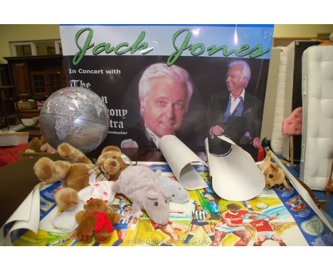 Miscellaneous cuddly toys, a globe and posters including Jack Jones in concert.