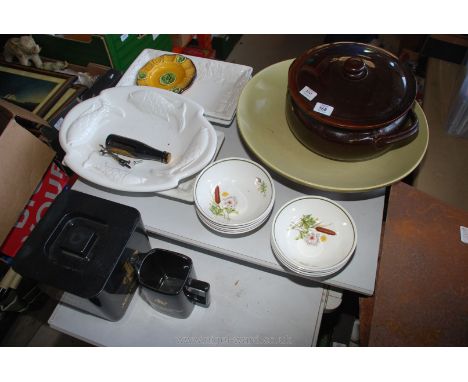 A tray of bowls, a casserole dish, an ice bucket, a fish platter, etc.,