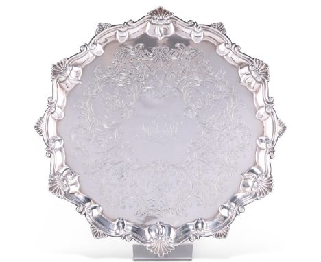 AN EARLY GEORGE III SILVER SALVER,&nbsp;by&nbsp;Thomas Hannam (or Hammond) &amp; Richard Mills, London 1764, with pie-crust e