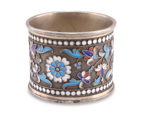 A RUSSIAN SILVER AND ENAMEL NAPKIN RING, marks rubbed, c.1900, circular, picked out with blue, red, white and turquoise ename