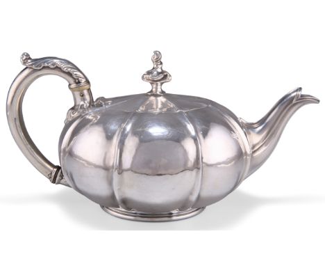 A WILLIAM IV SILVER TEAPOT,&nbsp;by Paul Storr, London 1831, melon-shaped, the scroll handle with substantial leaf-form thumb