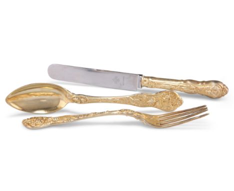 A FRENCH RARE SILVER-GILT THREE-PIECE CHRISTENING SET, Hunt pattern, comprising fork, knife and spoon. (3) Knife 21cm, 3.7 tr
