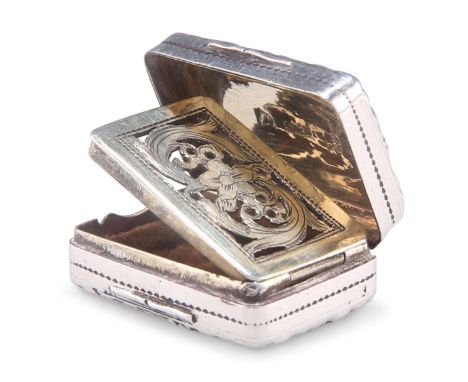 A GEORGE III SILVER VINAIGRETTE,&nbsp;by T Simpson &amp; Son, Birmingham 1818, rectangular, with a chased foliate border arou