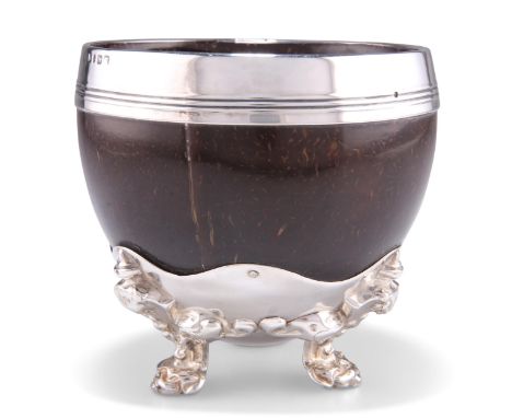 A VICTORIAN SILVER-MOUNTED COCONUT CUP,&nbsp;by&nbsp;Henry Wilkinson &amp; Co, Sheffield 1852, the silver rim with reeded ban