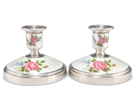 A PAIR OF ELIZABETH II SILVER AND ENAMEL CANDLESTICKS,&nbsp;by&nbsp;Adie Brothers Ltd, Birmingham 1962, each with stepped and