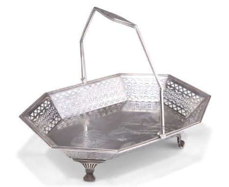 AN AESTHETIC MOVEMENT SILVER CAKE BASKET, by James Dixon & Sons Ltd, Sheffield 1884, of canted rectangular form with swing-ha