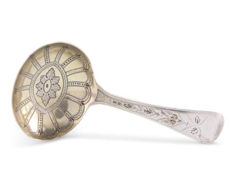 A GEORGE III SILVER CADDY SPOON,&nbsp;by I B, London 1808, with oval bowl, decorated with bright-cut engraving. 8.5cm long