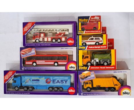 Dinky and Siku, a boxed Commercial and Emergency group to include Dinky 449 Johnston Road Sweeper, Siku 3433 Fire Engine and 