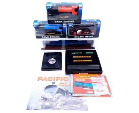 Atlas Editions and similar, a boxed group comprising of Train Models and Pocket Watch, to include Atlas Pacific A4 Class "Mal