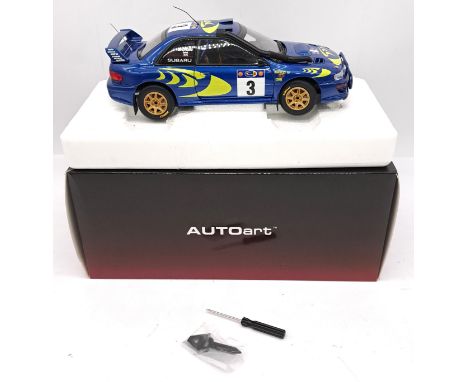 Autoart, a boxed 1:18 scale 89792 Subaru Impreza WRC 1997 with racing decal No.3 "Colin McRae/Nicky Grist" (Safari Winner). A