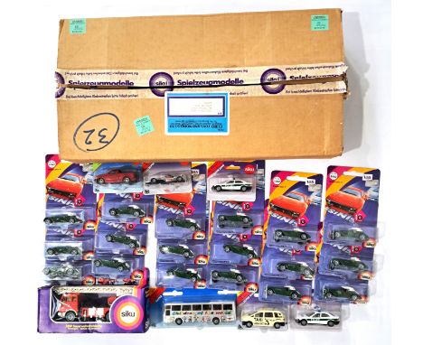 Siku, a carded and boxed group to include carded No.106 Morgan Plus 8, boxed 2819 Fire Engine and others. Also to include an 