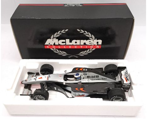 Minichamps (McLaren Collection) a boxed 1:18 scale Formula 1 Model 530991801 McLaren MP4/14 "M.Hakkinen". Although unchecked 