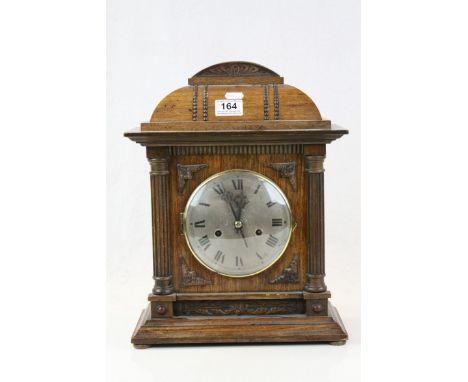 Dome topped Oak cased Mantle clock with Silvered metallic dial, comes with pendulum, measures approx 40 x 30.5 x 15cm