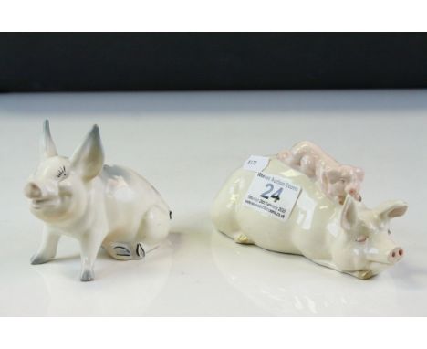 Two Beswick ceramic models of Pigs, one with a Piglet on it's back and approx 17cm long