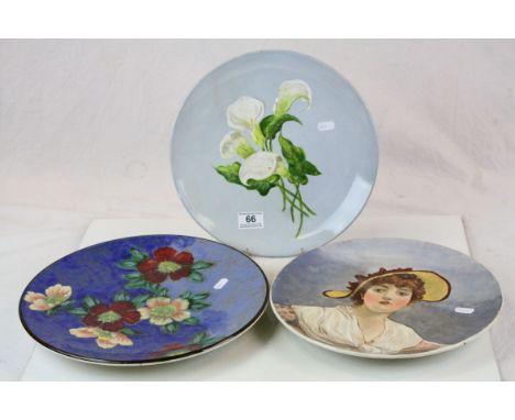 Two hand painted Doulton Lambeth Chargers, each approx 31cm diameter, one of them a Female portrait, dated 1883 to reverse pl