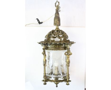 Mid 20th century Portuguese brass ceiling hanging light with figurative supports and pierced decoration with floral etched gl