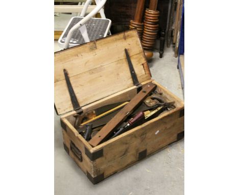 Vintage wooden toolbox containing a large quantity of tools, planes, chisels, screwdrivers, saws etc