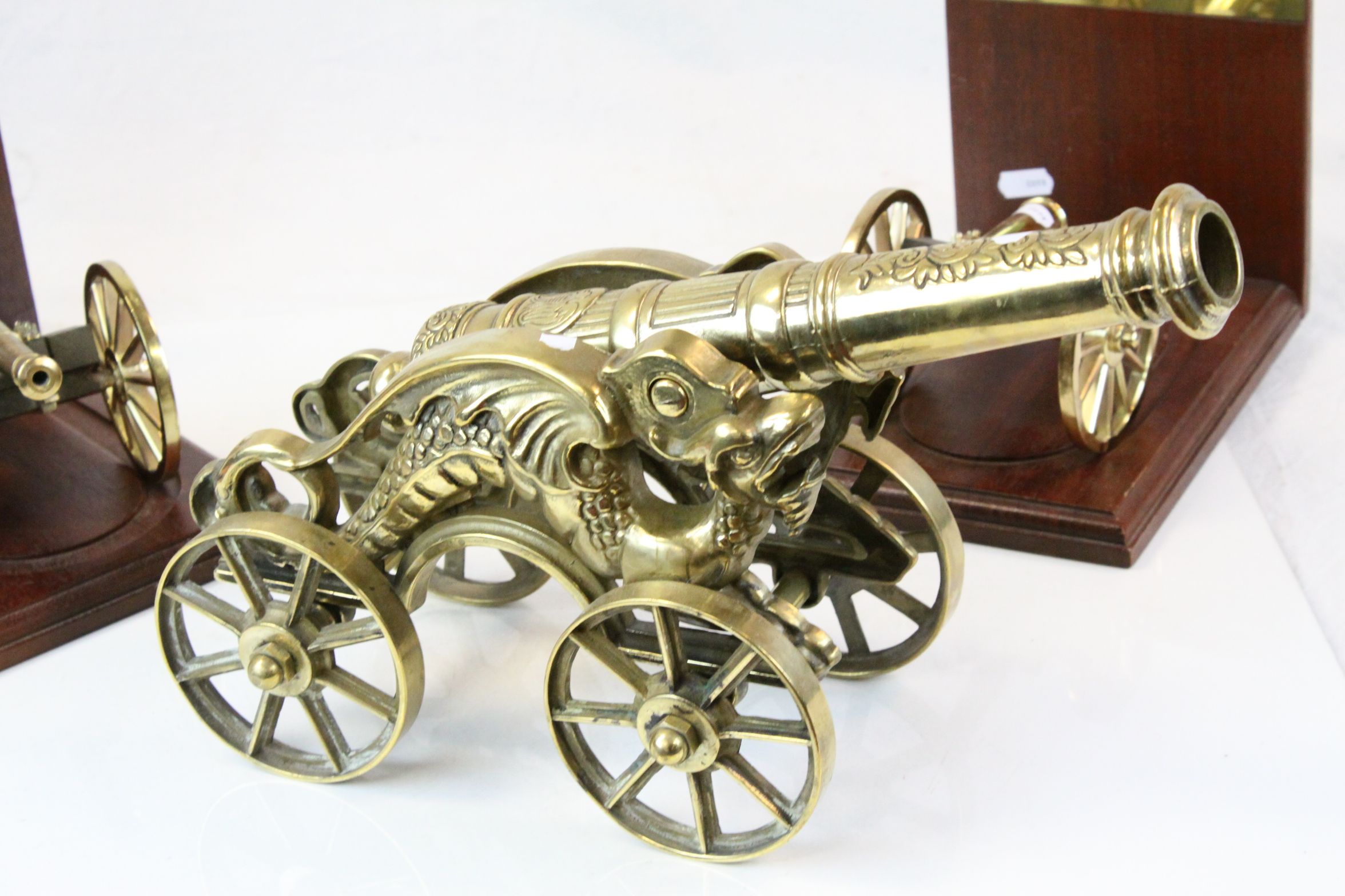 Pair of Bookends in Brass & Wood, modelled as Field Cannons from the