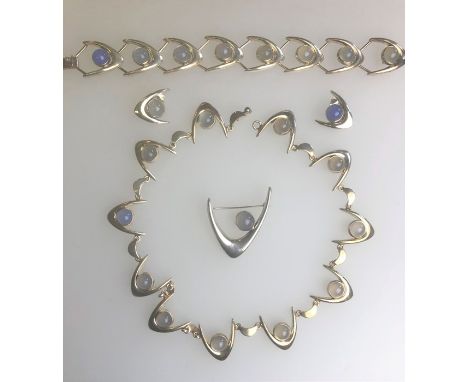 Arne Johansen - A suite of Danish contemporary white metal jewellery comprising necklace, bracelet, brooch and clip-on earrin