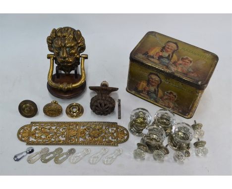 A heavy brass lion-mask door knocker, to/w two pairs of cut glass door-knobs and five smaller examples, three glass keyhole c