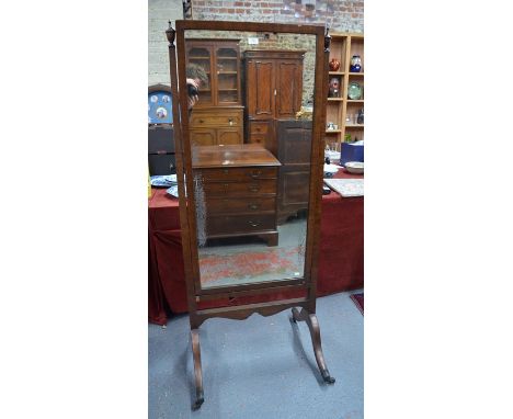 A 19th century mahogany framed cheval mirror, the distressed rectangular plate raised on four swept legs to brass castors, 70
