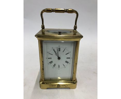 A 19th century French brass carriage clock, the two train hour repeat movement stamped 'B', chiming on a coiled gong, the cas