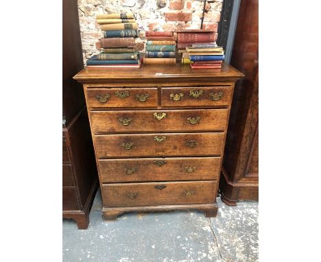 An 18th century oak chest of two short over four long graduated drawers, raised on shaped bracket feet,100 cm w x 53 cm x 122
