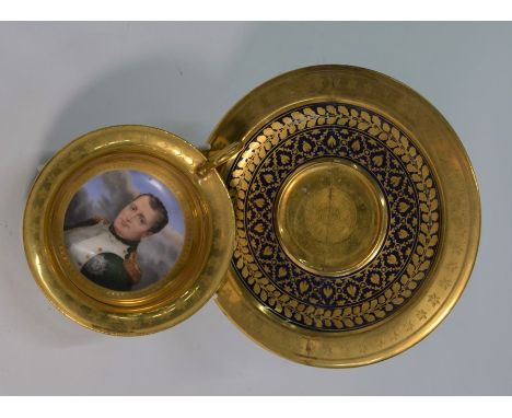 A 19th century French cabinet cup and saucer, the bowl handpainted with a portrait of Napoleon Bonaparte (2)Saucer cracked an