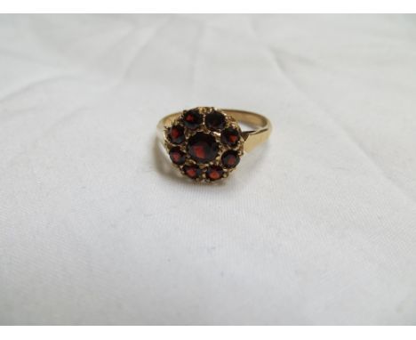 9ct Gold ring with ruby cluster. Size M/N. Gross weight: 2.4g