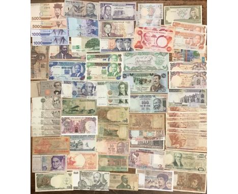 Very large World Banknote Collection. Please see all pictures for details.  Some of the notes have been stuck down by a small