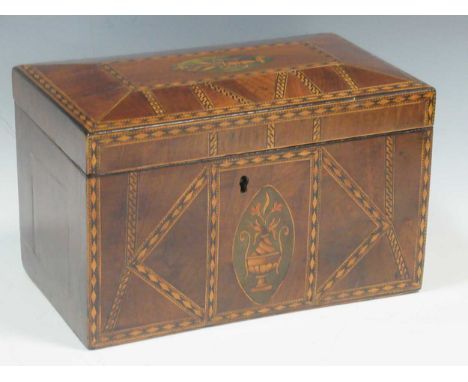 A George III inlaid tea caddy with trophy motif