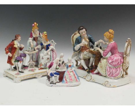 Three Continental porcelain models of figures in antique dress playing chess (3)