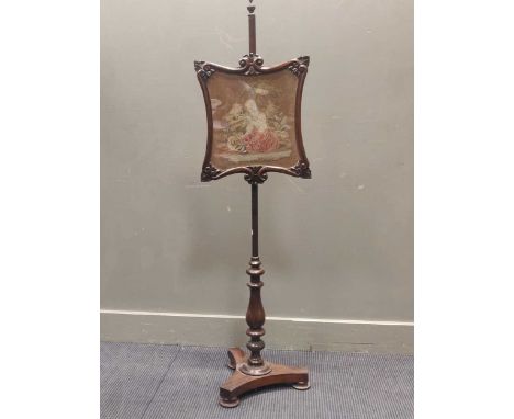 A Victorian mahogany and rosewood pole screen, with tapestry panel of a yound girl 144cm high