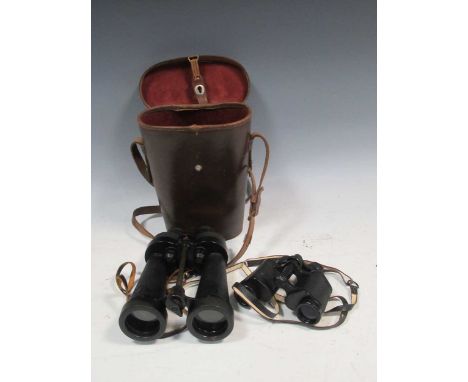 Leather cased Navy issue binoculars by Barr &amp; Stroud, 7X CF41, marked with broad arrow symbols; and another smaller pair 