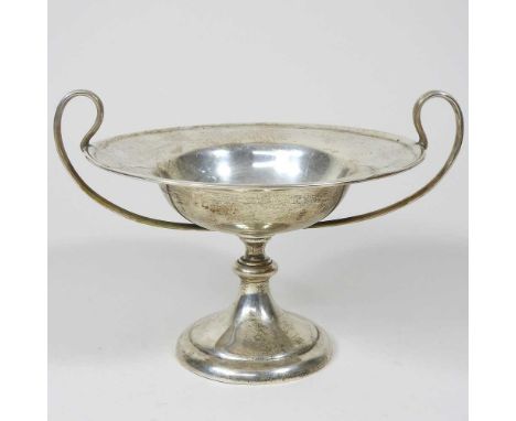 An Edwardian silver bowl, of pedestal form, with stylised handles, London 1910, 305g, 20cm diameterOverall condition is compl