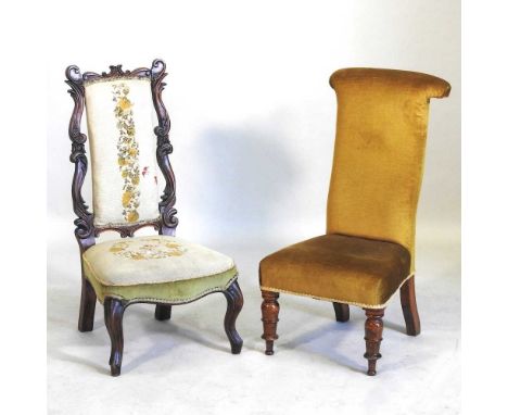 A Victorian carved walnut and tapestry upholstered prie dieu chair, together with another chair (2)