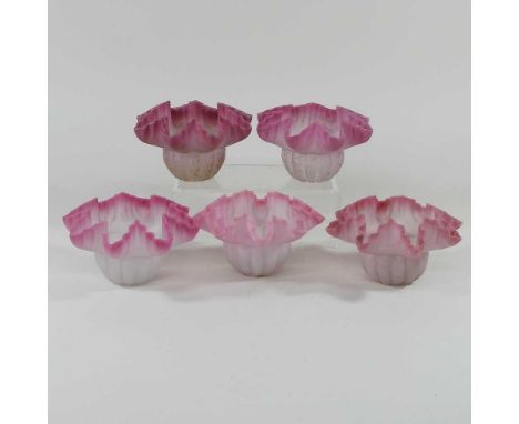A collection of five cranberry glass light shades, each with a frilled rim and 3cm aperture (5)